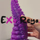 Purple twisted tentacle dildo with pointed tip and generous sea creature details by Exo Reya