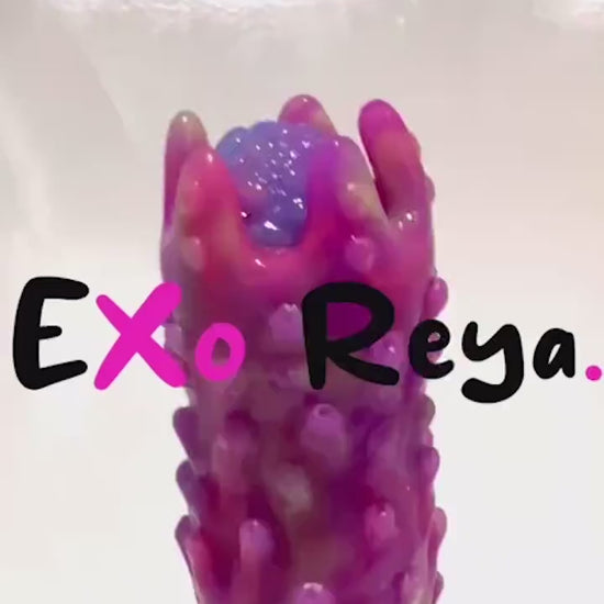 Glow in the dark purple pink fantasy ovipositor toy made with premium silicone ejecting eggs