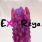 Glow in the dark purple pink fantasy ovipositor toy made with premium silicone ejecting eggs